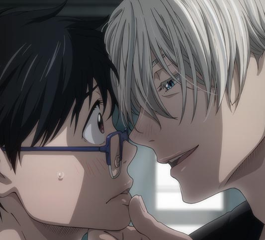 Katsuki Yuuri 勝生勇利 is held by the chin by Victor Nikiforov ヴィクトル・ニキフォロフ.