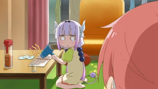 Kanna Kamui カンナカムイ, trying to dry her homework, on which she spilled tea, by using a hairdryer from which wavy lines come symbolizing the hot air.